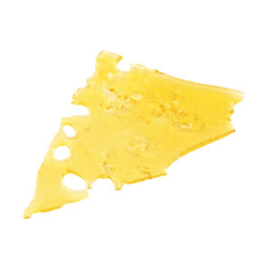 Sour Diesel shatter, a form of cannabis concentrate with yellow-amber hue and glass-like texture on white background.